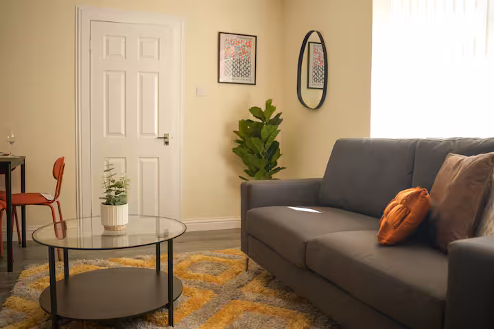 Good looking sofa at Fully Furnished Short Term Rental Properties in Wishaw